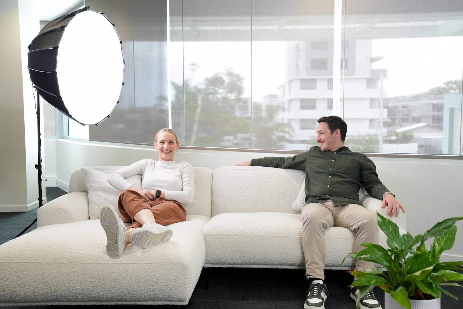 SEO Team members sitting in the Digital Nomads HQ Head Office